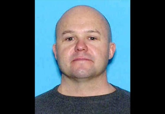 This undated image provided by the Colorado Springs Police Department on Tuesday, July 17, 2012 shows Brian Joseph Hedglin.